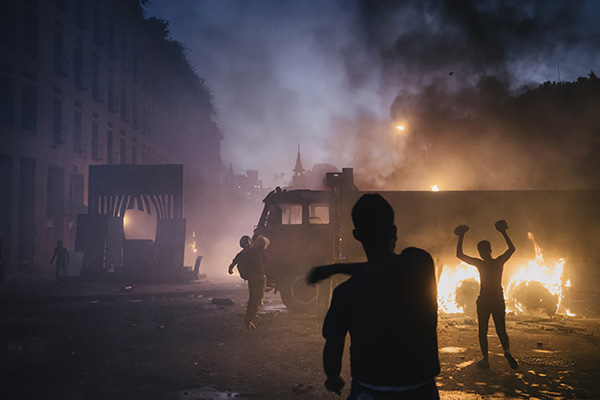BEIRUT, LEBANON - AUGUST 8:Protesters clashes with security forces in central Beirut during a demonstration against the government.After the incident anger has grown among Lebanese citizen toward the establishment. Officials and experts involved in investigating the explosion suggest that neglect, ignorance and stifling bureaucracy played a major part in the tragedy. (Photo by Lorenzo Tugnoli/ Contrasto for The Washington Post)